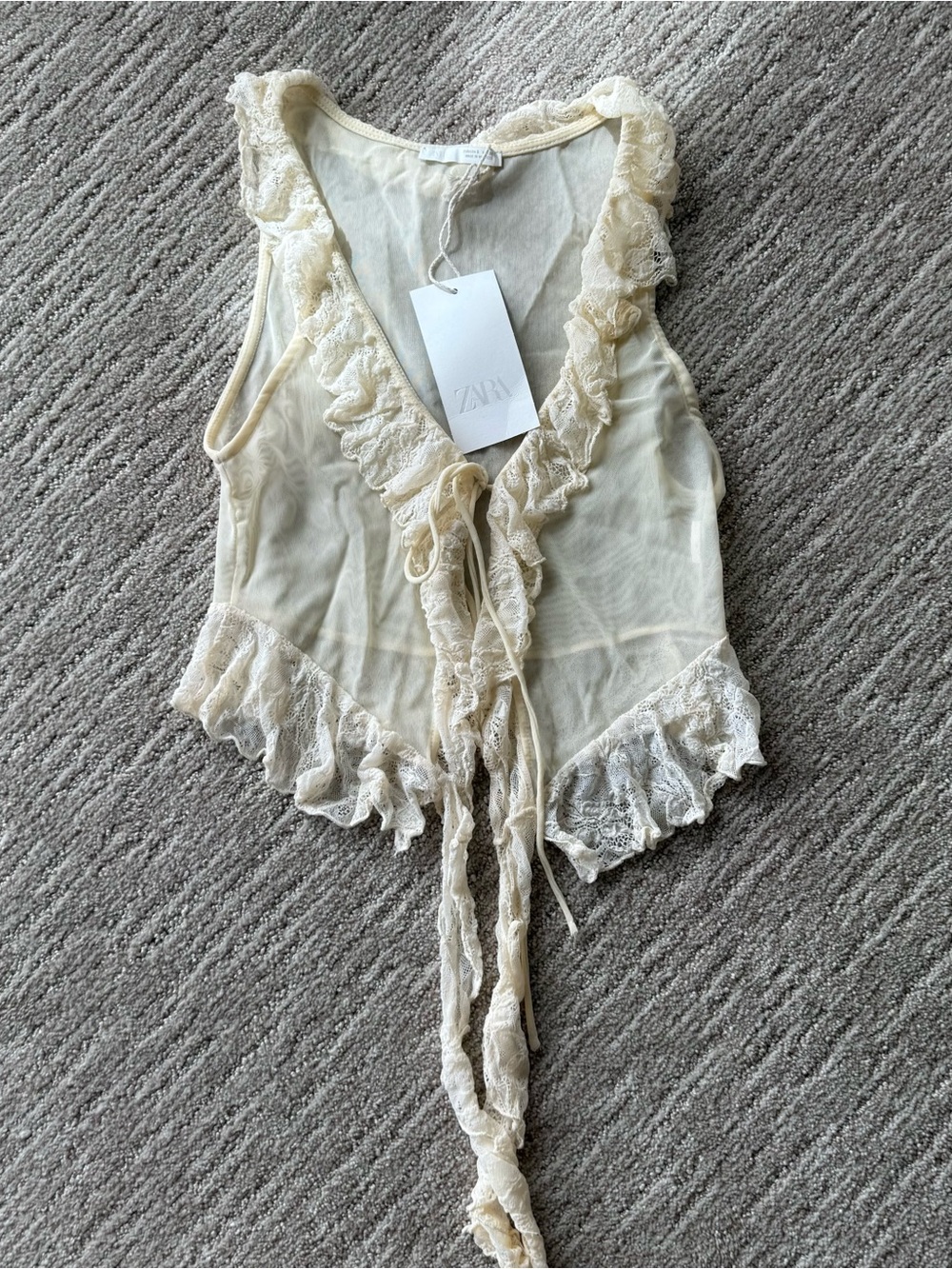 Zara Sheer Lace-Trim Ruffle Top Tie Front in Cream